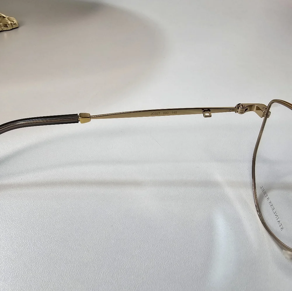 JIMMY‎ CHOO 52 MM gold-toned women's eyeglasses frames with removable chain.